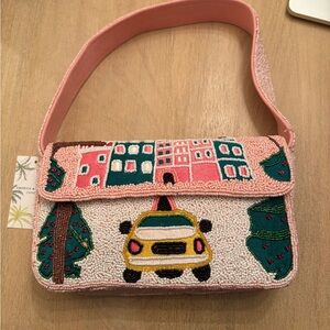 America & Beyond beaded NYC taxi bag